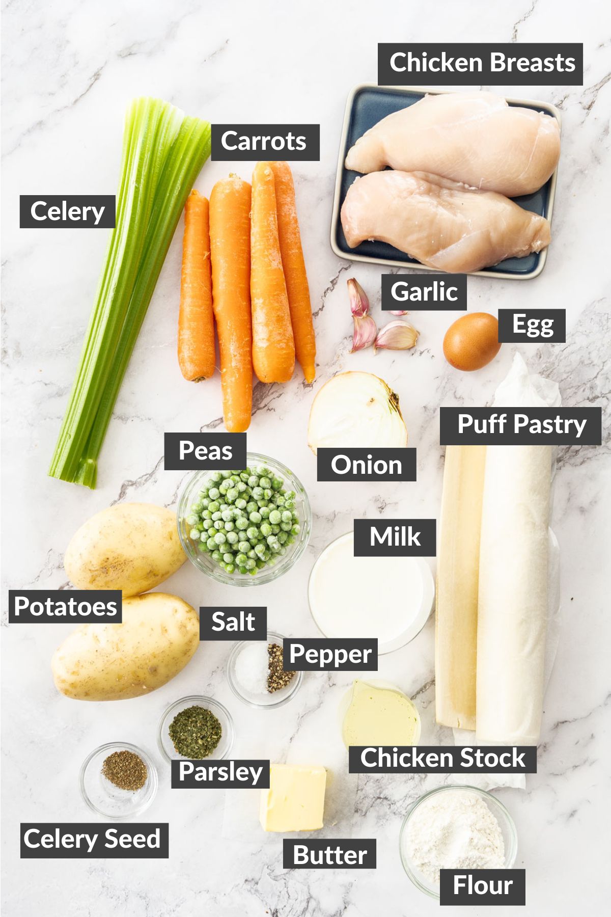 ingredients on a white marbled board.