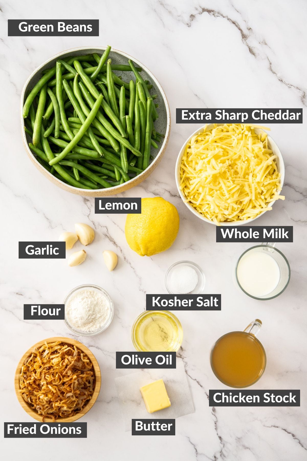 ingredients in bowls on a marbled board.