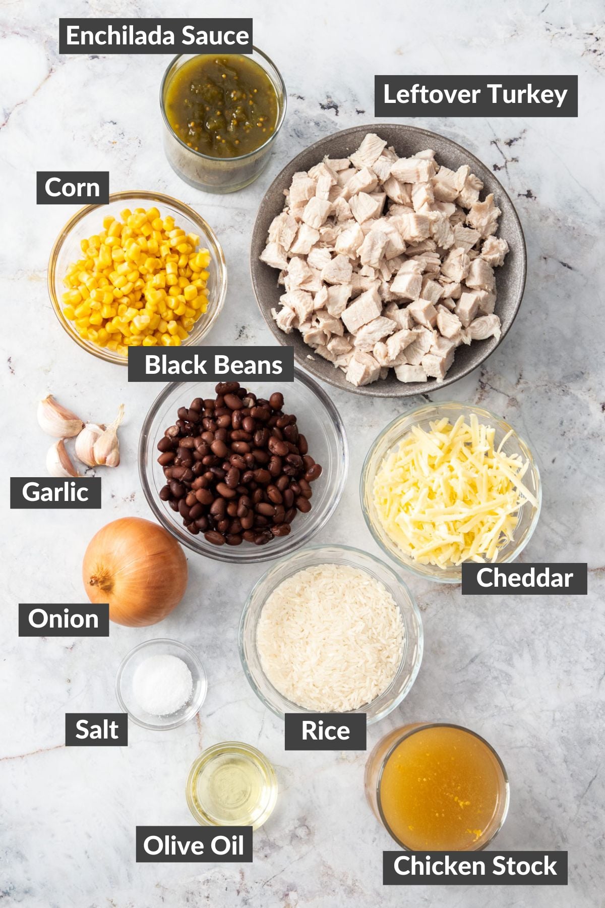 ingredients in bowls on a marbled board.