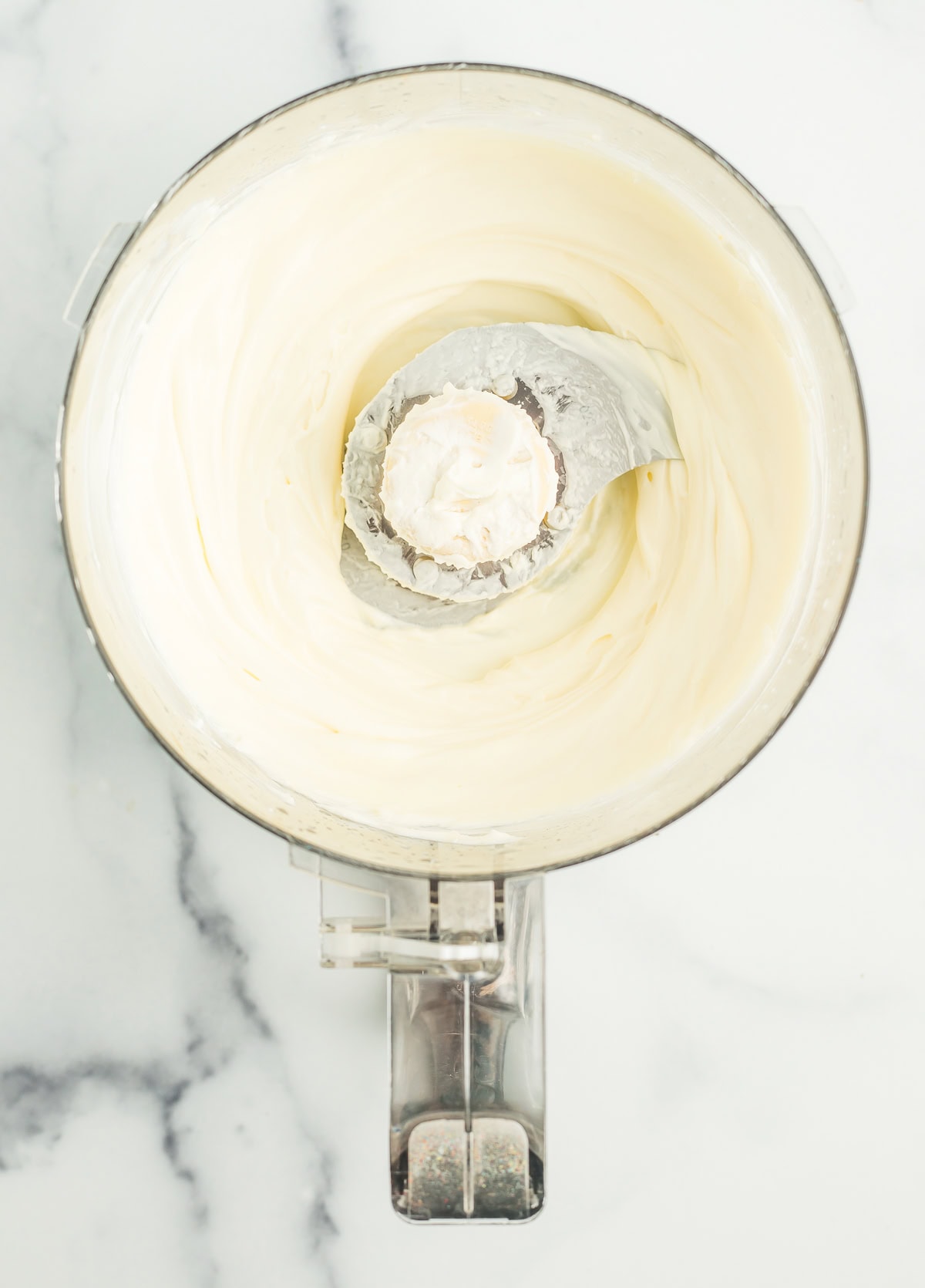 cream cheese and greek yogurt in a food processor.