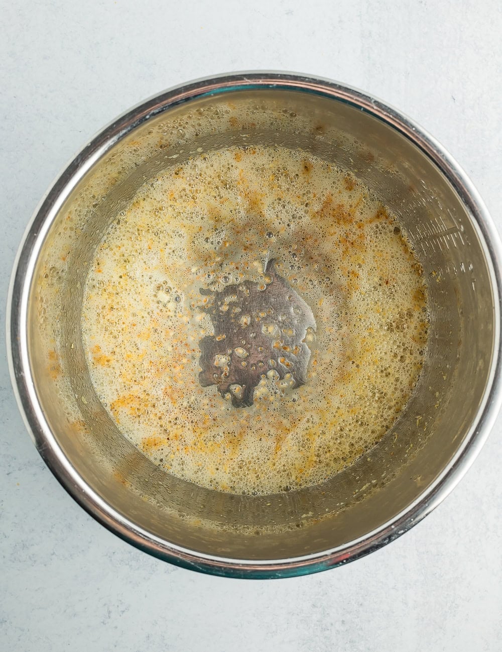 butter and sauteed garlic in a stainless pot.