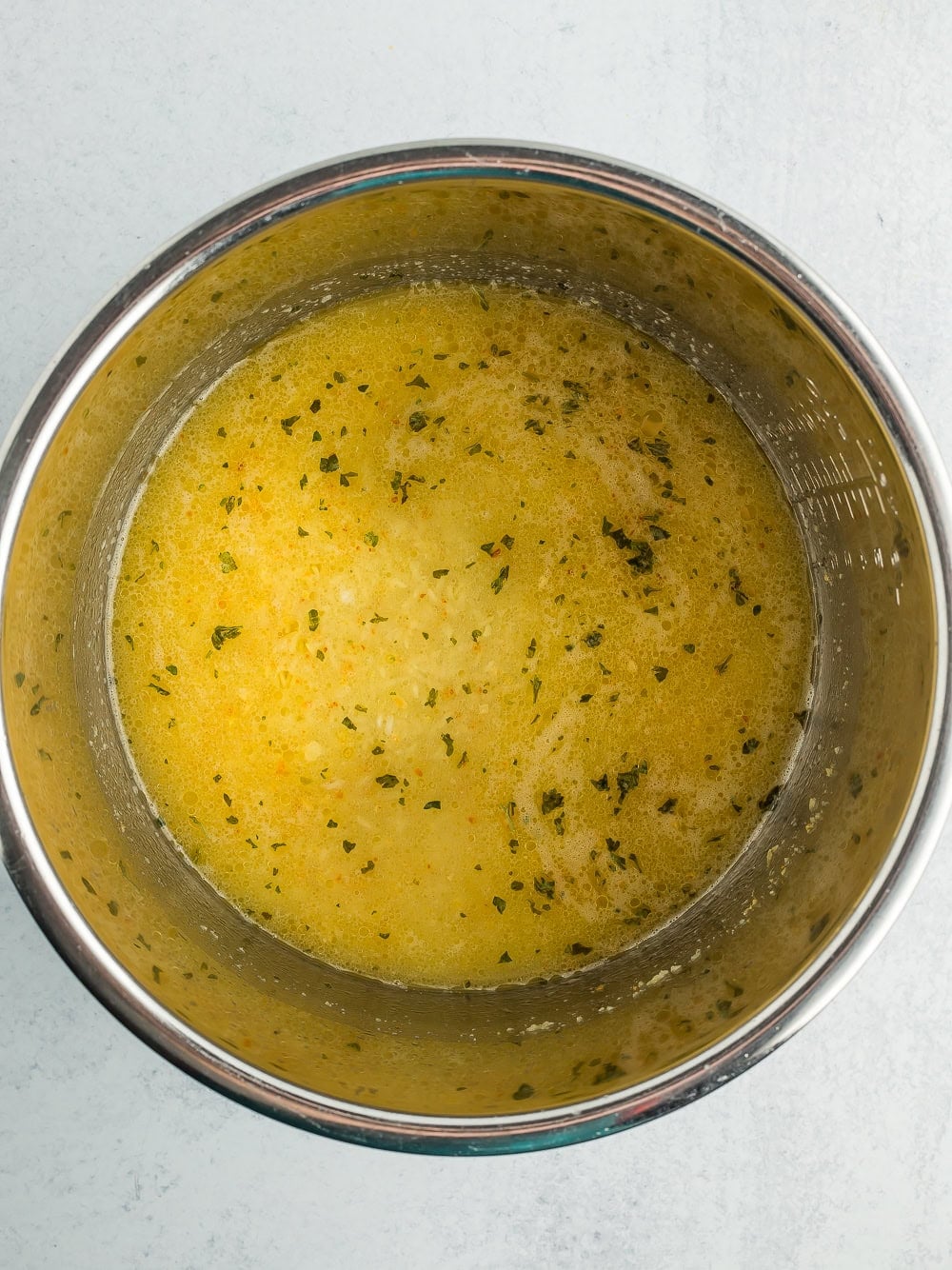 broth in a stainless pot.