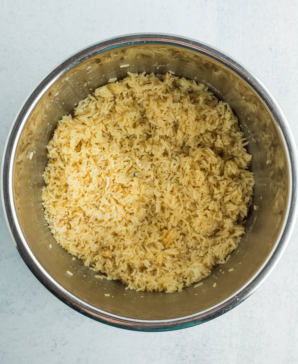 cooked rice in a stainless pot.