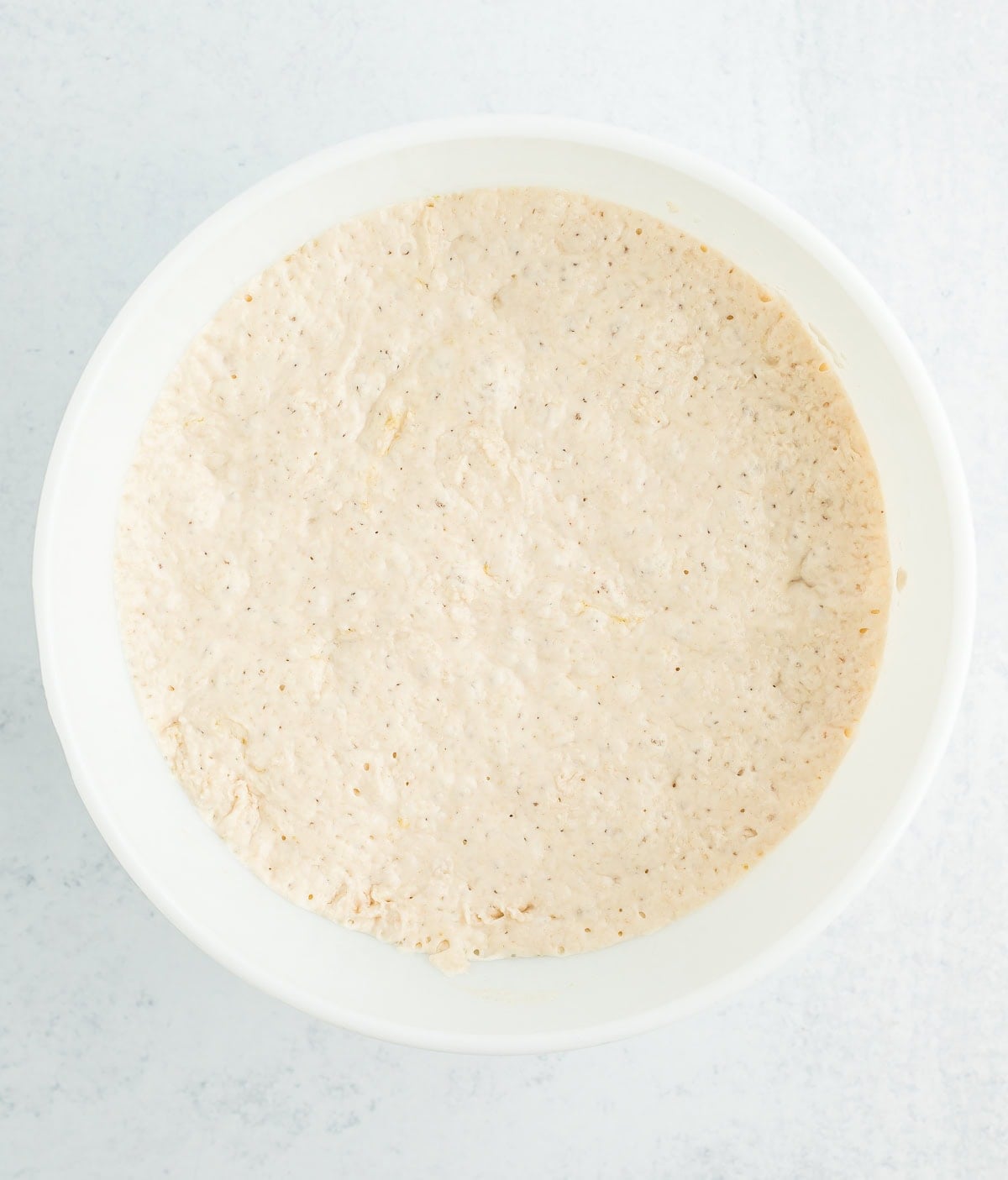 batter in a white mixing bowl.
