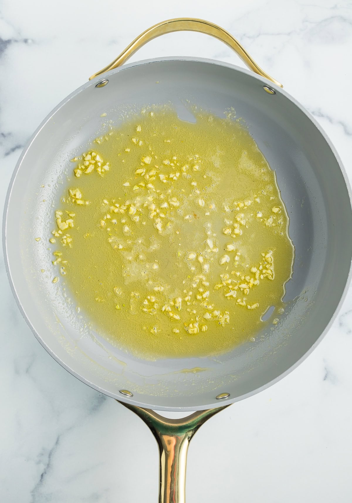 butter and garlic in a skillet.
