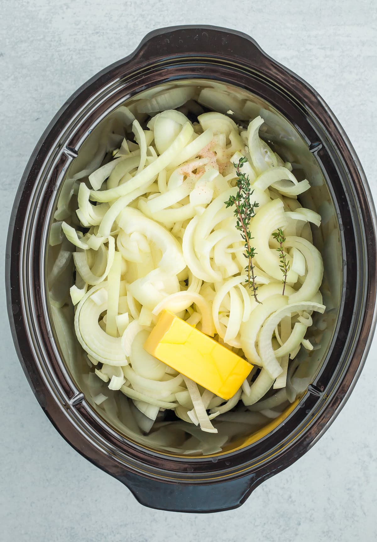 raw ingredients in a crockpot.
