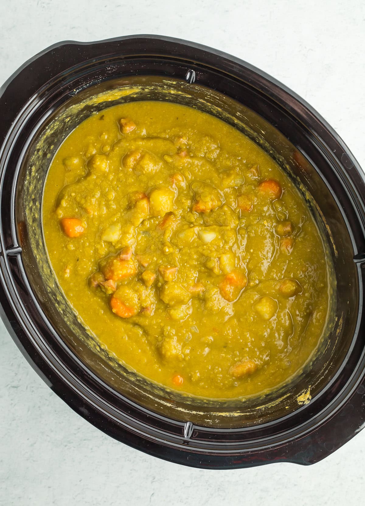 a crockpot full of soup.