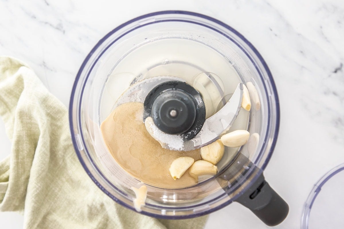 garlic and tahini in a food processor.