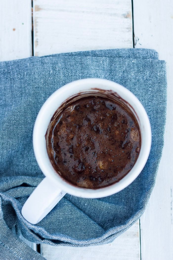 slightly cooked batter in a white cup.