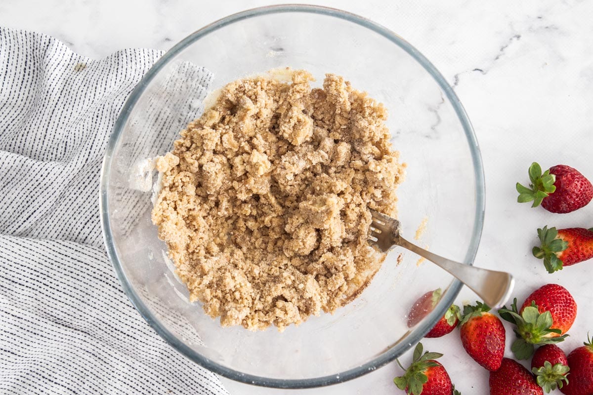ingredients for a crisp topping in a glass bowl.