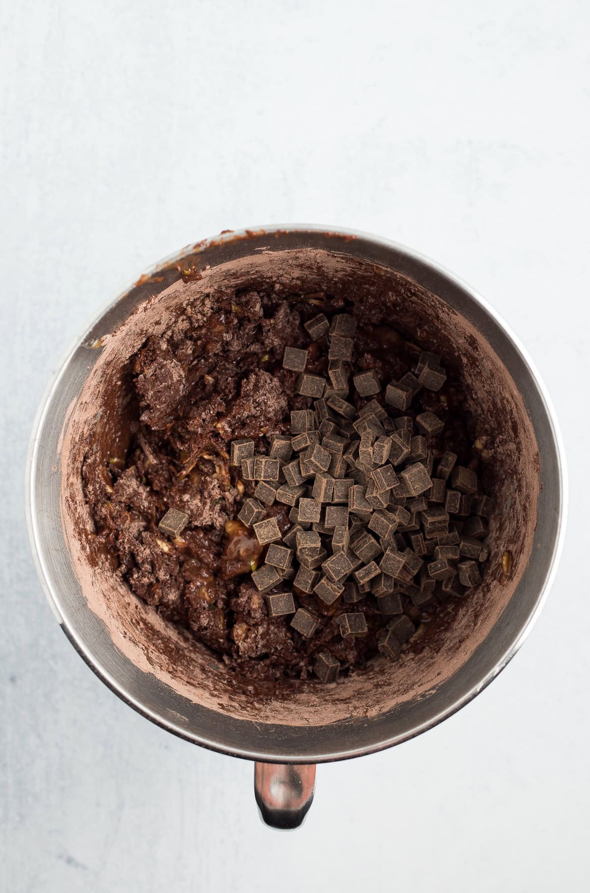 chocolate chunks and batter in a mixing bowl.