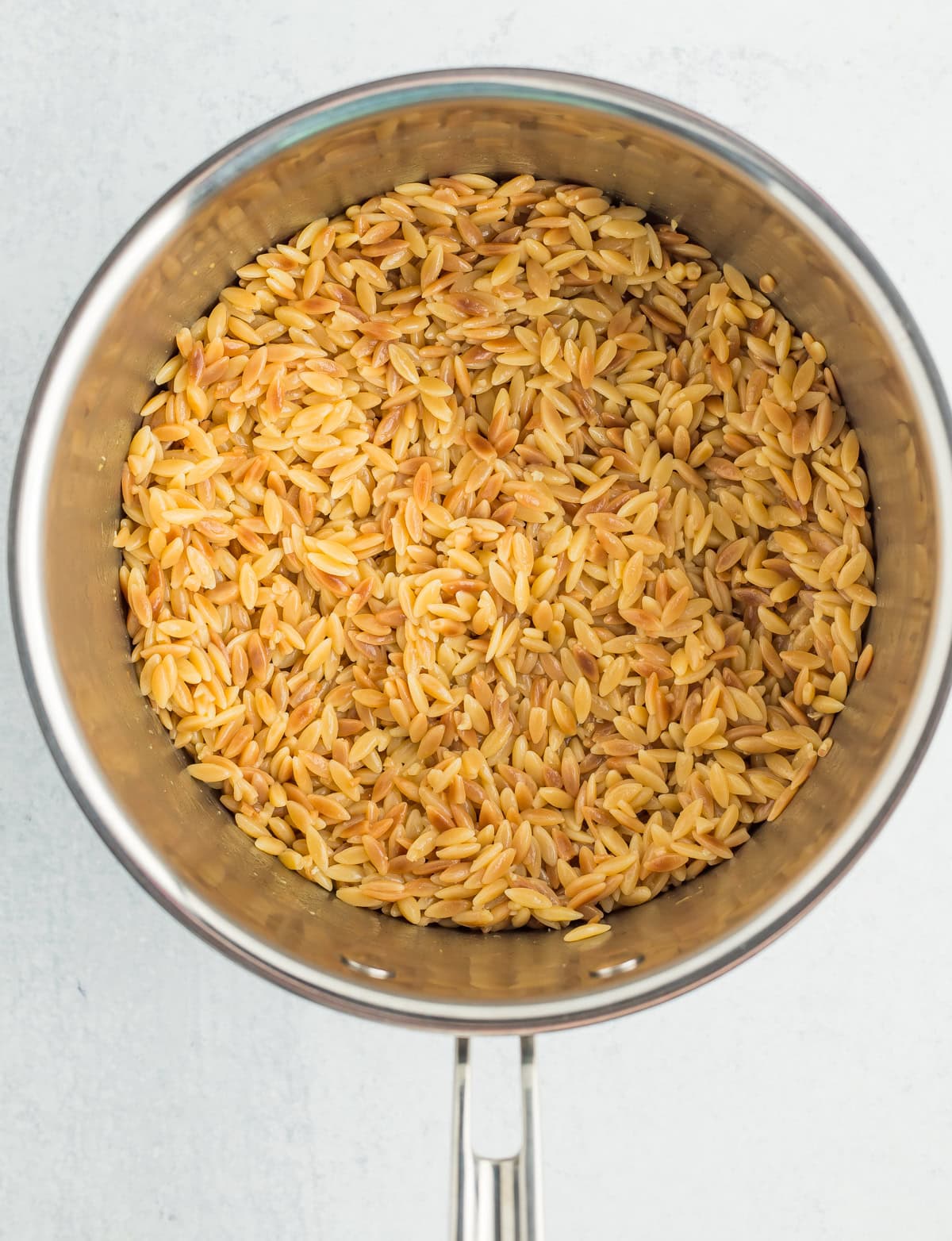 cooked pasta in a saucepan.