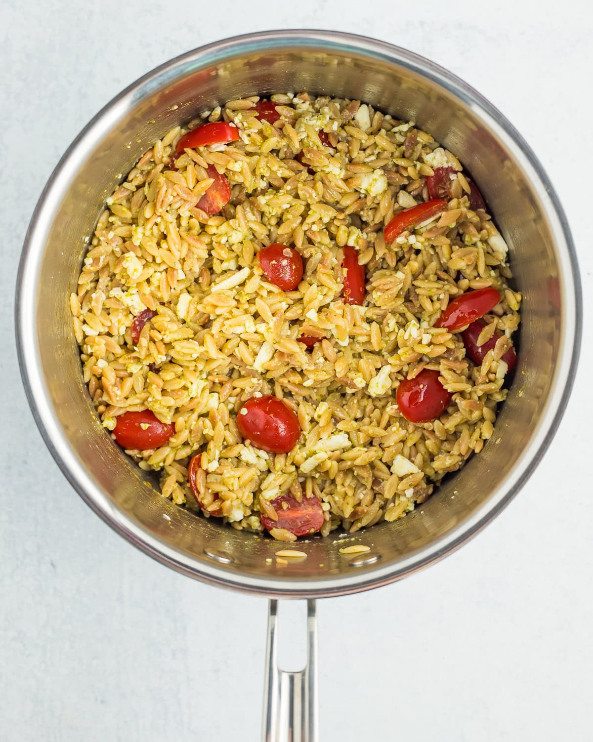 combined ingredients and pasta in a saucepan.