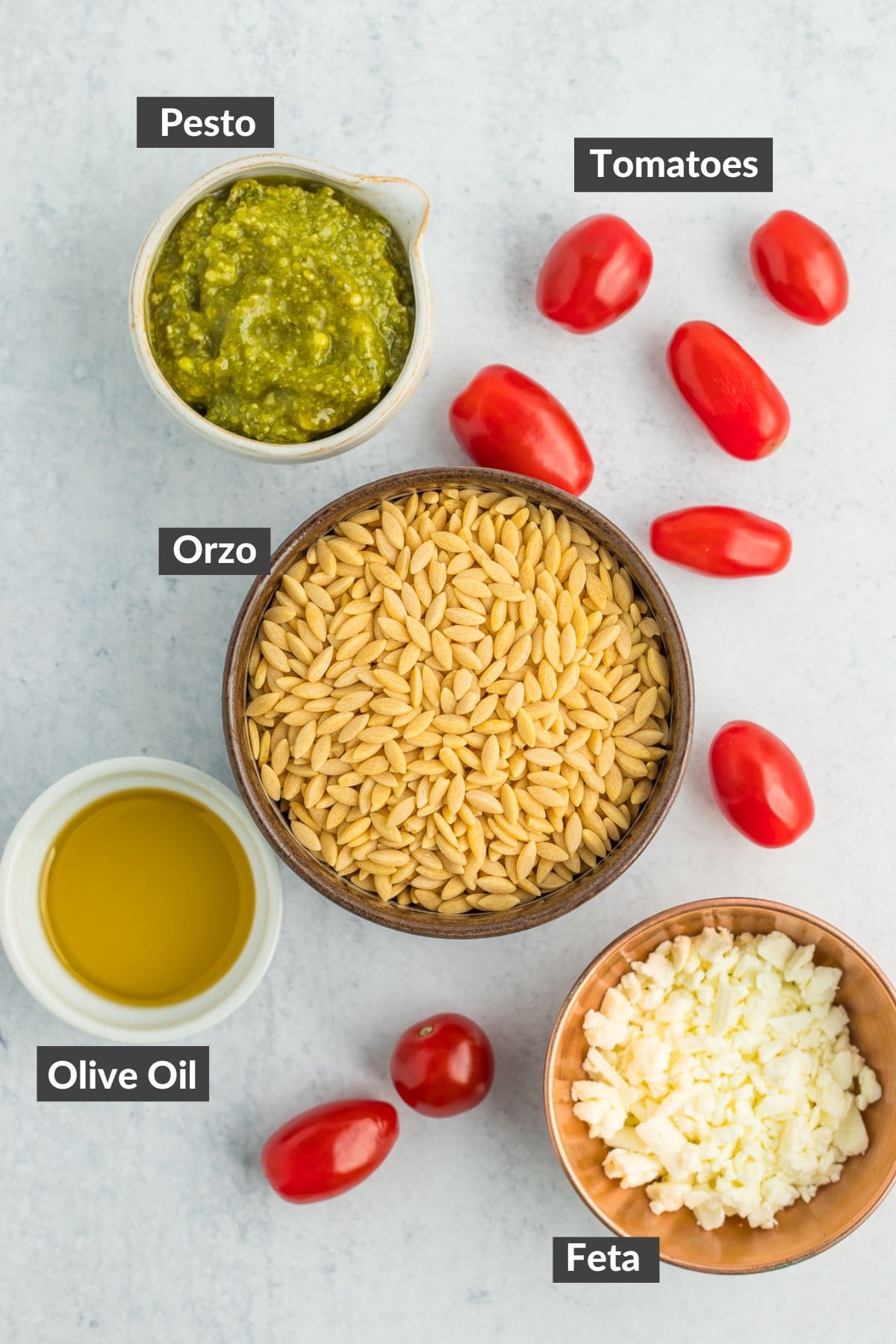 ingredients in bowls on a grey board.