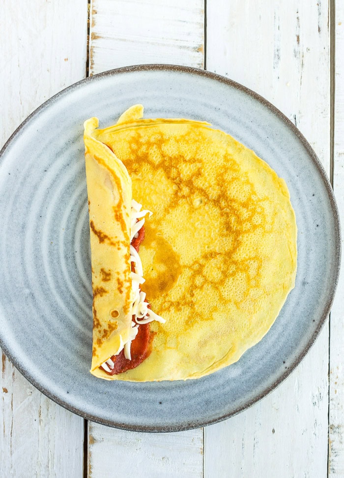 a crepe being rolled.