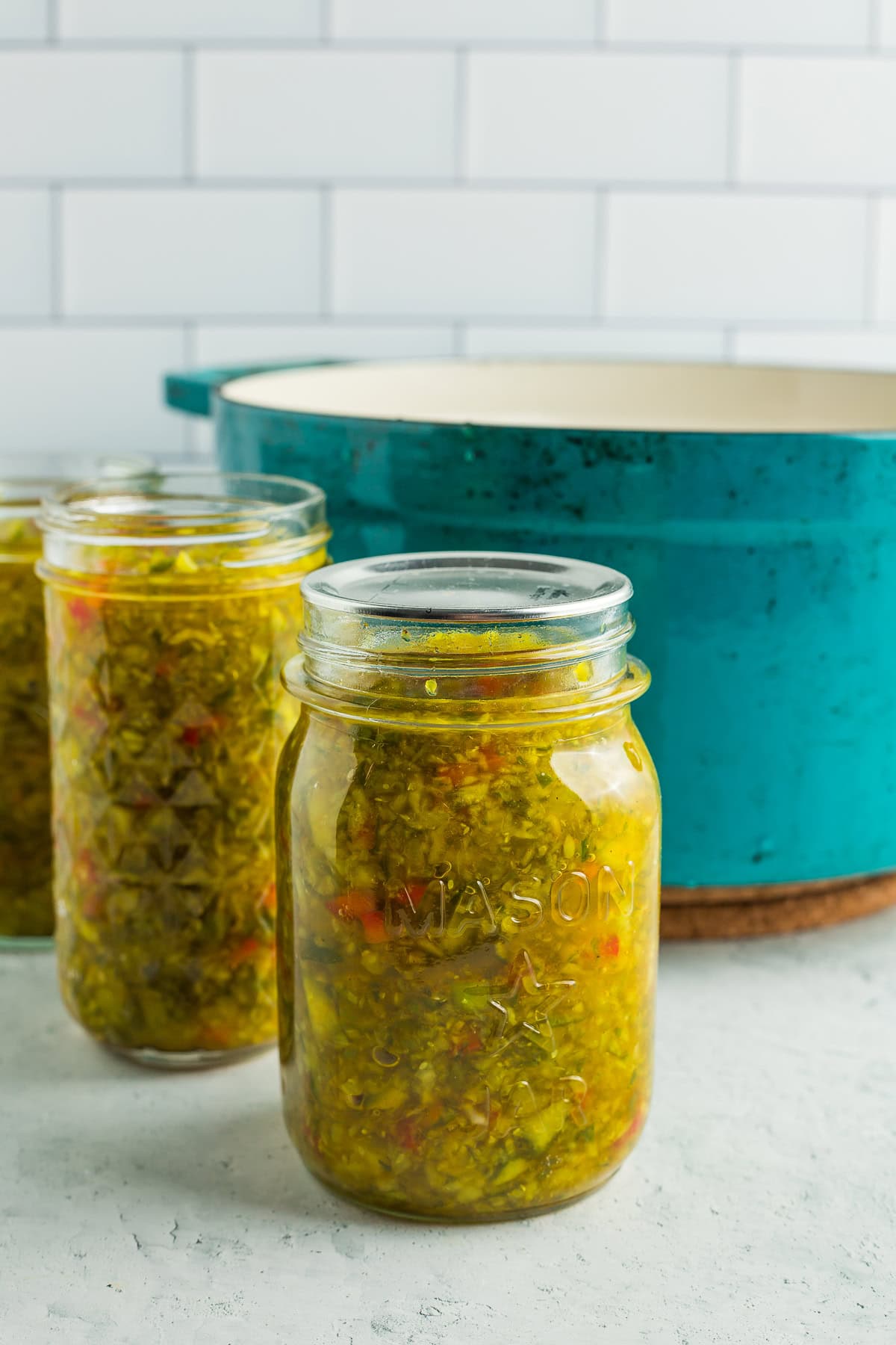 a canning jar with a lid on it.
