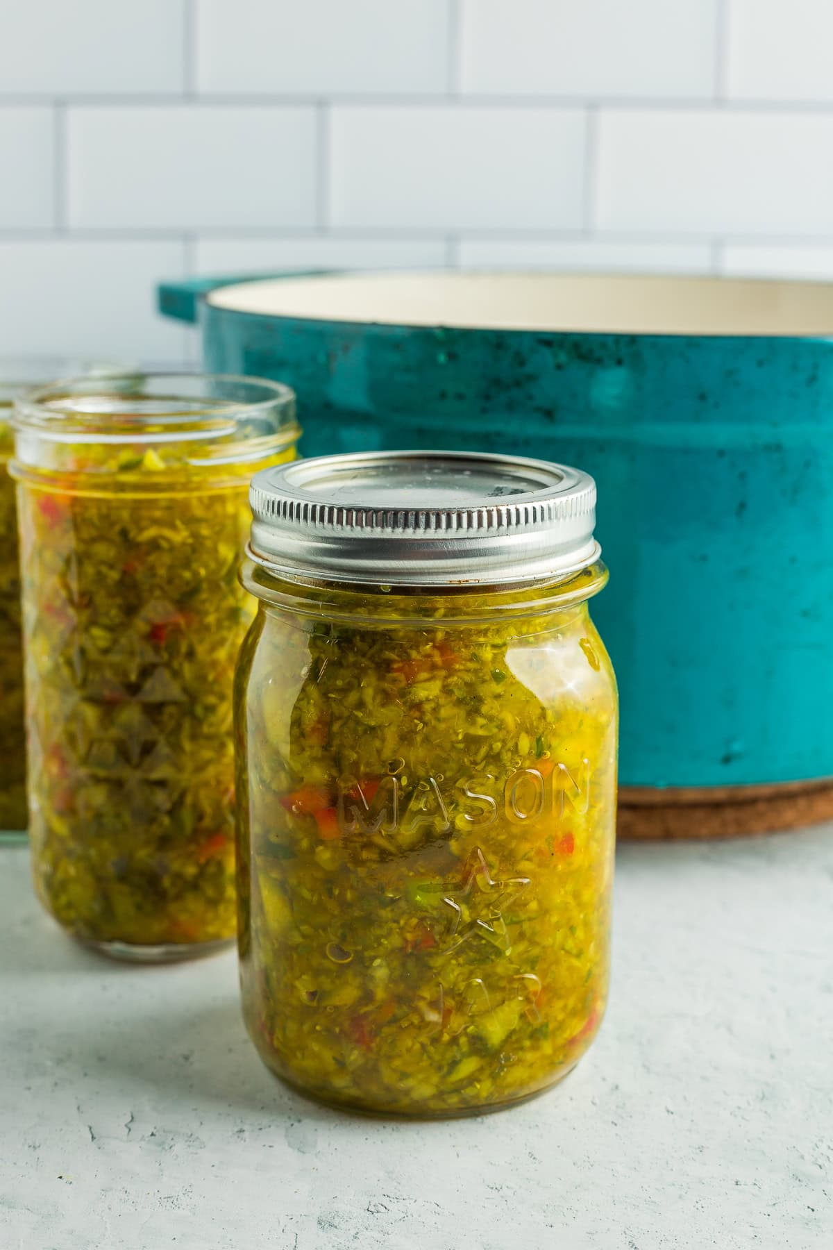 a canning jar with a lid and ring on it.