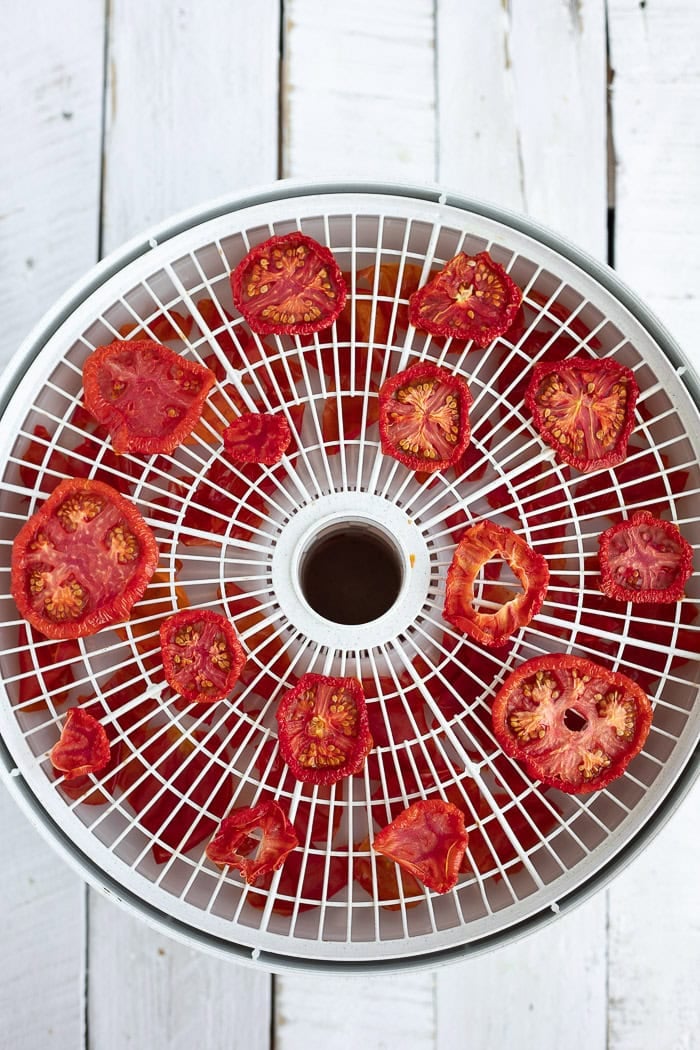 dried tomatoes on trays.