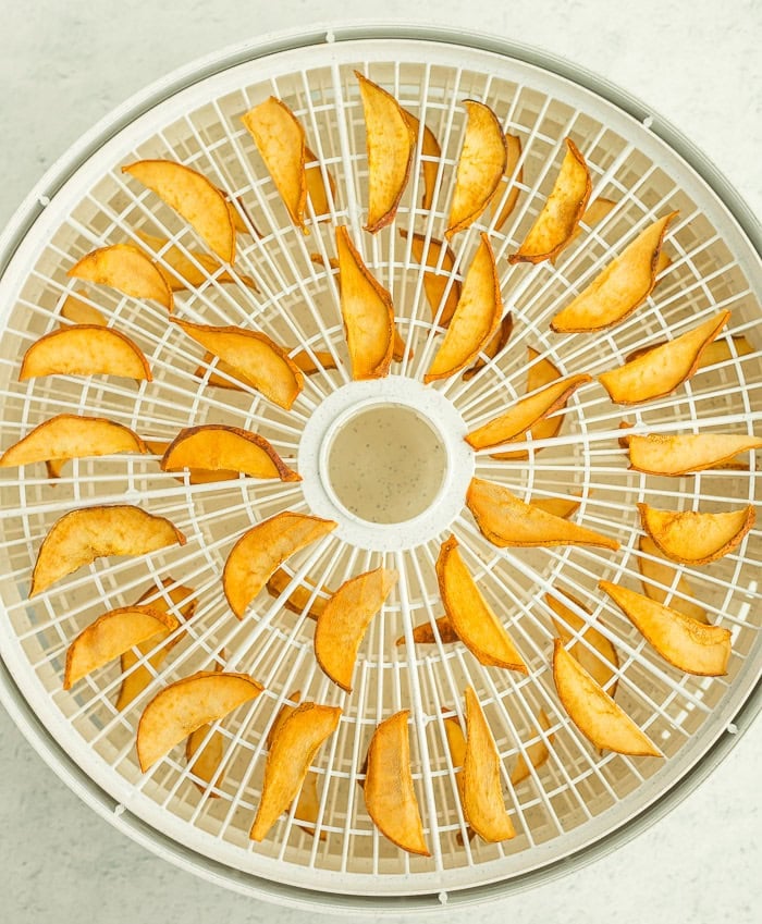 dried pears on a dehydrator tray.