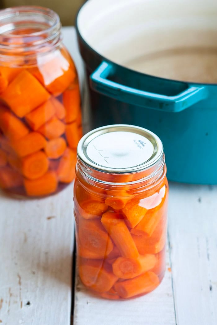 a canning jar with a lid on it.