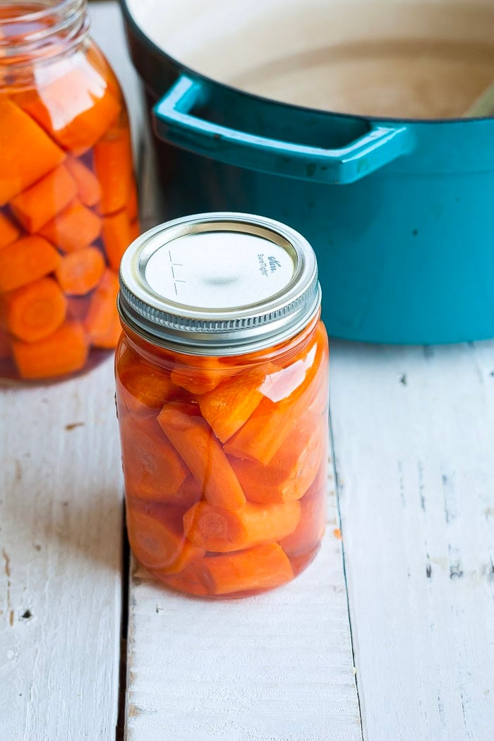 a canning jar with a lid and a ring on it.