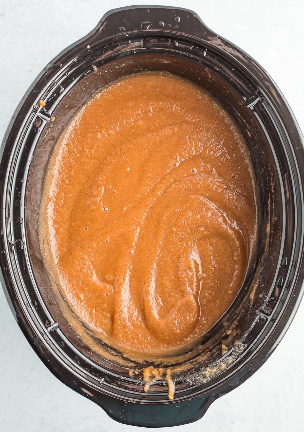 blended apple butter in a crockpot.